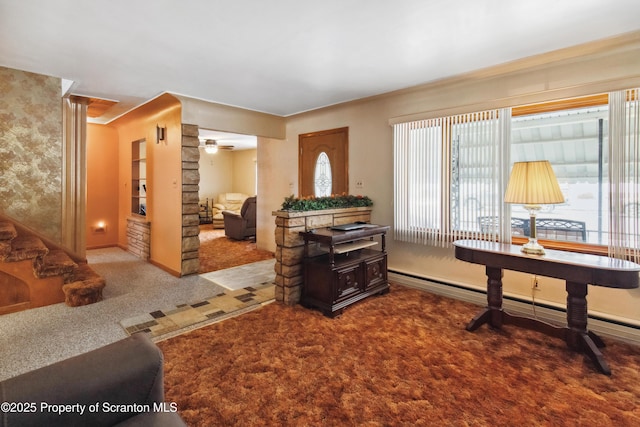 carpeted living room with ceiling fan