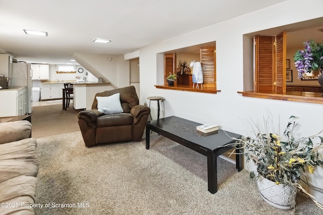 living room with light carpet