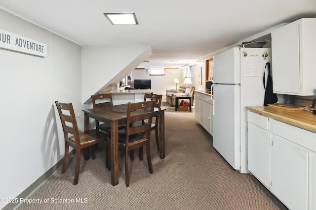 view of carpeted dining room