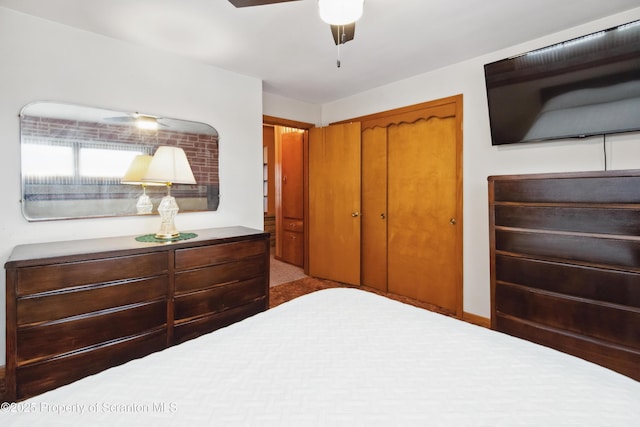 bedroom featuring a closet and ceiling fan