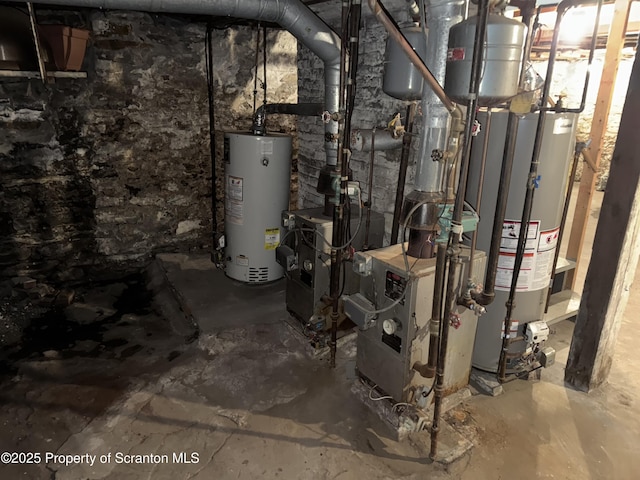 utility room featuring gas water heater