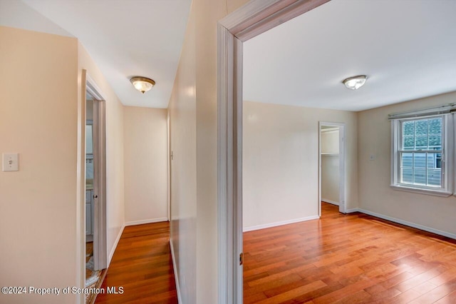 hallway featuring hardwood / wood-style flooring