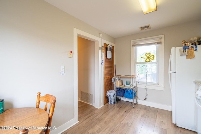 dining space featuring light hardwood / wood-style floors