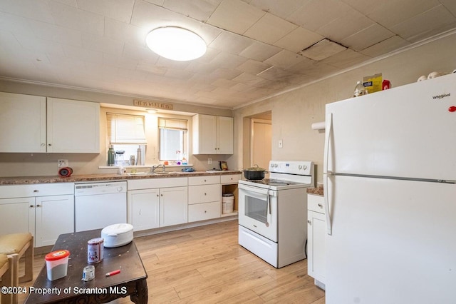 kitchen with white cabinets, light wood-type flooring, white appliances, and ornamental molding