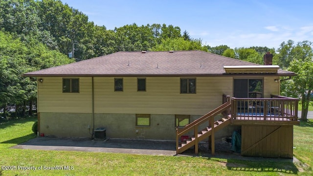 1103 Quarry Rd, Old Forge, PA 18518 - rear view of house featuring stairs, a patio area, a chimney, and a yard