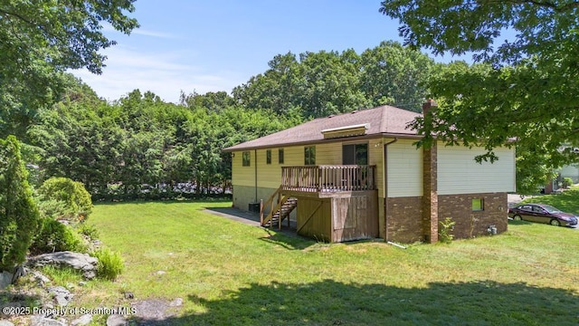 1103 Quarry Rd, Old Forge, PA 18518 - view of grassy yard with stairs and a deck
