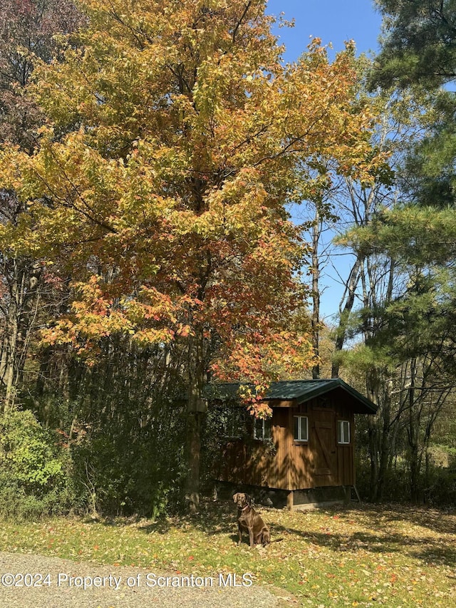 3365 Lake Of Meadows Rd, Little Meadows, PA 18830 - view of property exterior featuring a storage shed