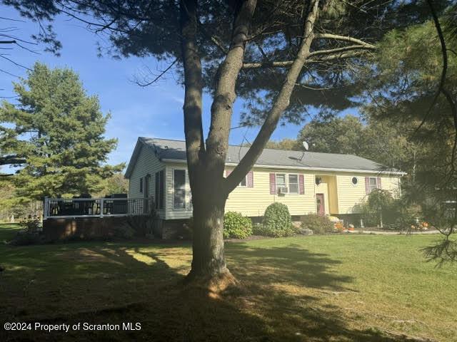 view of front of house with a front yard