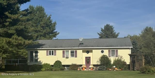 exterior space featuring a yard