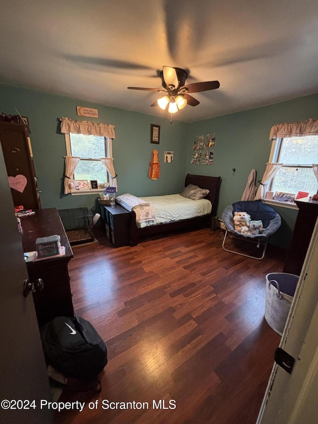 3365 Lake Of Meadows Rd, Little Meadows, PA 18830 - bedroom with multiple windows, wood finished floors, and ceiling fan