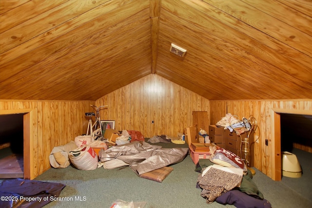 bonus room with wooden walls and wooden ceiling