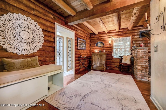 mudroom featuring beamed ceiling, dark hardwood / wood-style flooring, and wooden ceiling