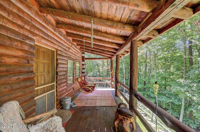 deck featuring covered porch