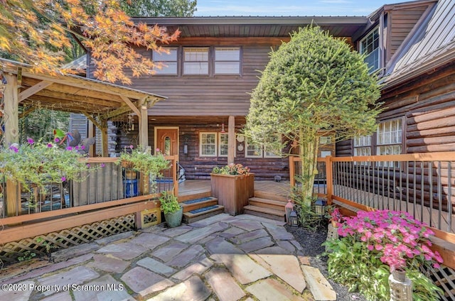 view of patio featuring a deck