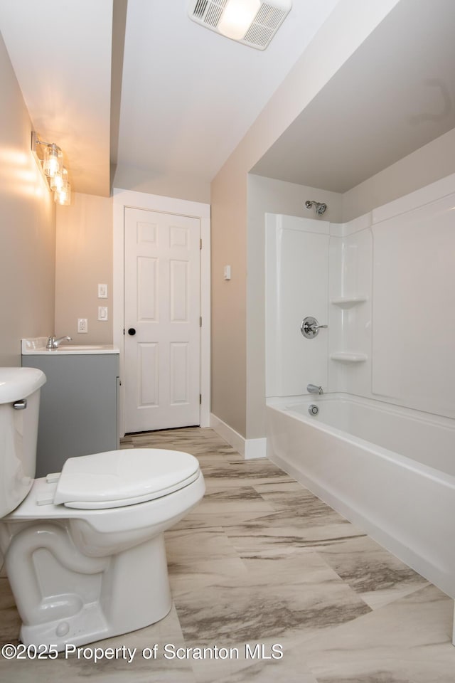 full bathroom featuring shower / bath combination, vanity, and toilet