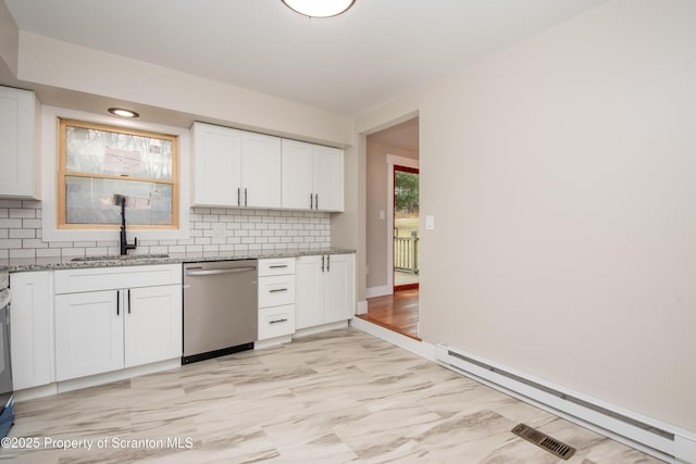 kitchen with a baseboard heating unit, sink, white cabinetry, and dishwasher