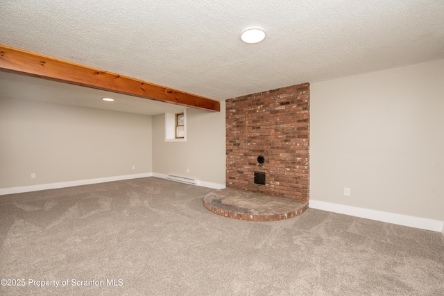 basement with carpet, a textured ceiling, and a baseboard radiator