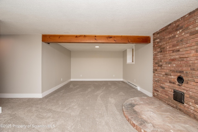 unfurnished living room with a textured ceiling, beamed ceiling, carpet, and baseboard heating