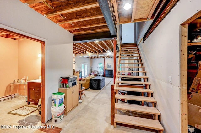 basement featuring a baseboard radiator