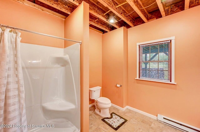 bathroom featuring a shower with shower curtain, toilet, and a baseboard radiator