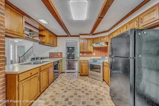 11 Manzer Rd, New Milford, PA 18834 - kitchen with freestanding refrigerator, high end stainless steel range, under cabinet range hood, beamed ceiling, and light countertops