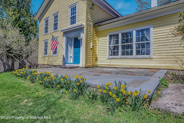 11 Manzer Rd, New Milford, PA 18834 - view of exterior entry featuring a chimney