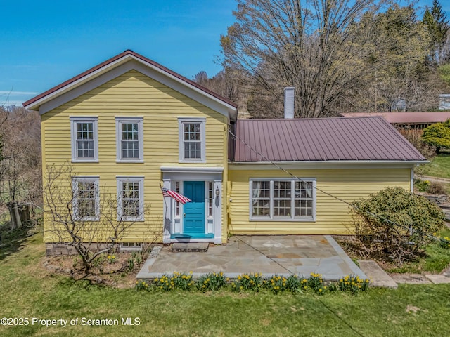 11 Manzer Rd, New Milford, PA 18834 - back of house featuring a lawn, a metal roof, and a patio