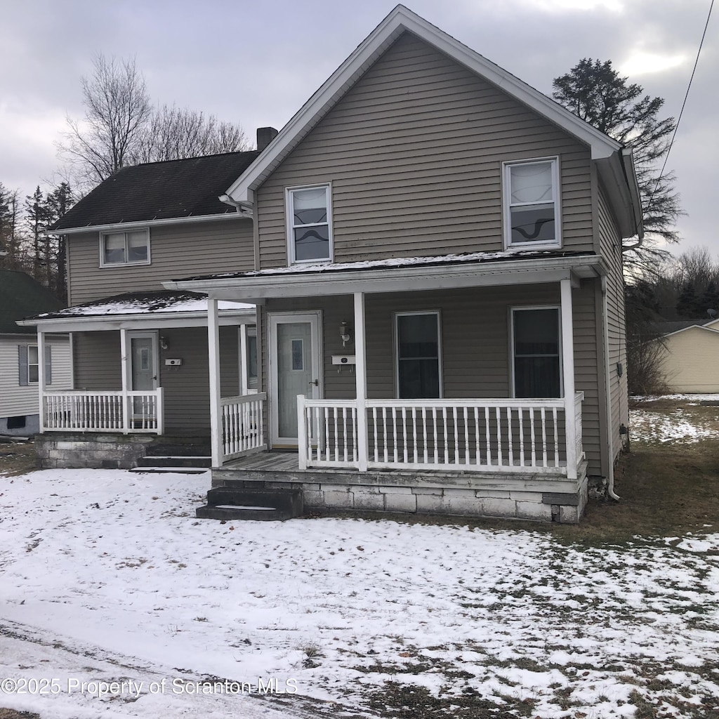 view of front of house with covered porch