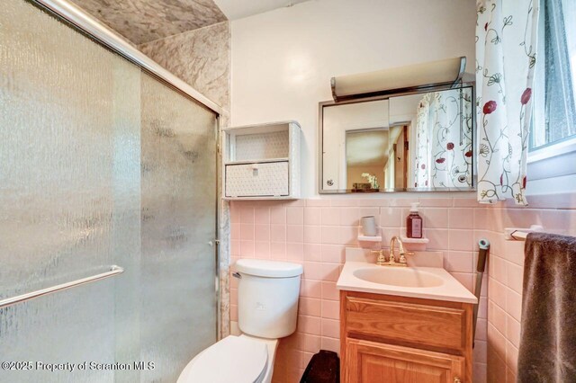 21 Leslie Dr, Scranton, PA 18505 - full bath with vanity, tile walls, toilet, and a stall shower