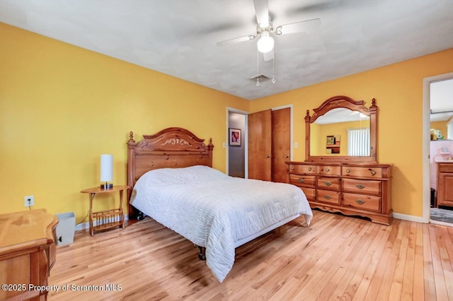 21 Leslie Dr, Scranton, PA 18505 - bedroom with light wood finished floors, baseboards, and ceiling fan