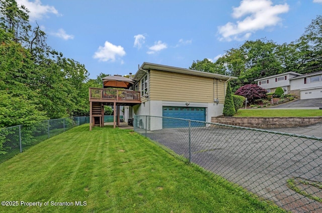 21 Leslie Dr, Scranton, PA 18505 - view of side of property featuring asphalt driveway, a garage, a deck, and stairway