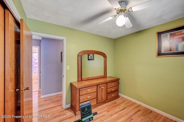 21 Leslie Dr, Scranton, PA 18505 - bedroom with light wood finished floors, baseboards, and ceiling fan