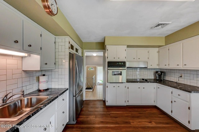 21 Leslie Dr, Scranton, PA 18505 - kitchen with stainless steel appliances, a sink, tasteful backsplash, white cabinets, and under cabinet range hood