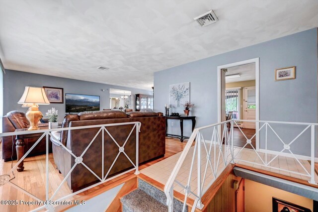 21 Leslie Dr, Scranton, PA 18505 - stairs featuring plenty of natural light and wood finished floors