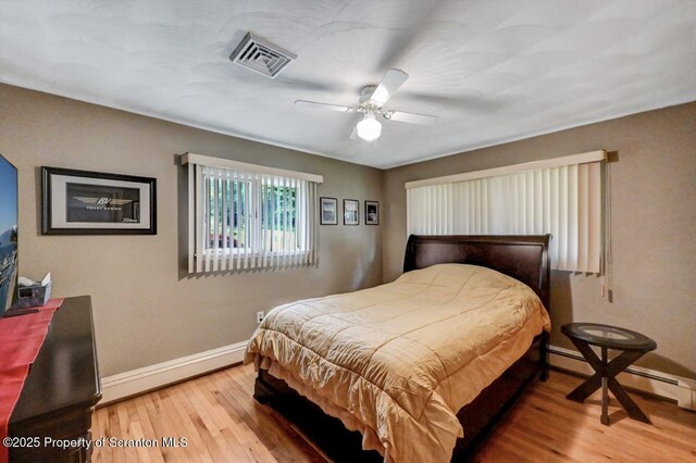 21 Leslie Dr, Scranton, PA 18505 - bedroom with baseboards, light wood-style flooring, and ceiling fan