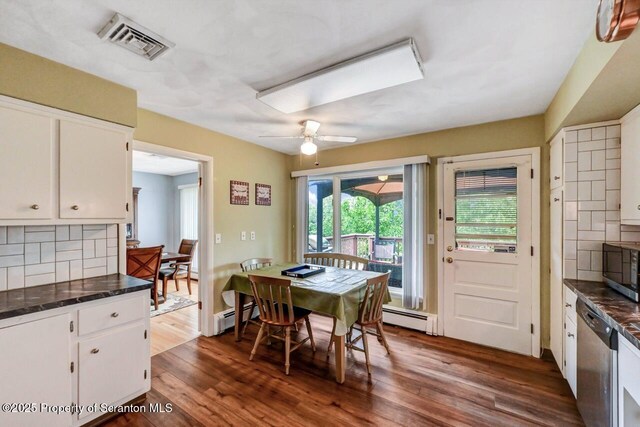 21 Leslie Dr, Scranton, PA 18505 - dining area with baseboard heating, dark wood-type flooring, and ceiling fan