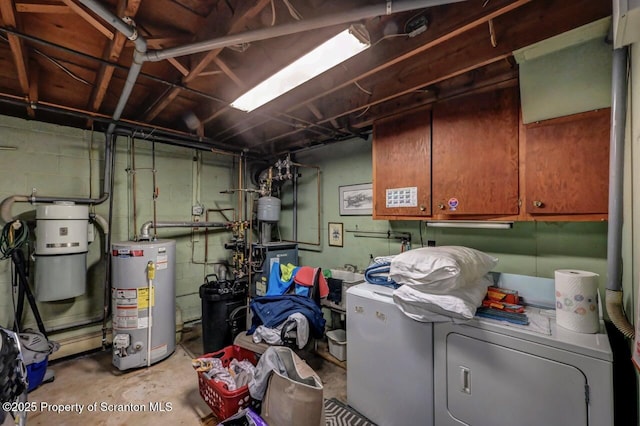 21 Leslie Dr, Scranton, PA 18505 - unfinished below grade area featuring water heater, washer and dryer, a central vacuum unit, and concrete block wall