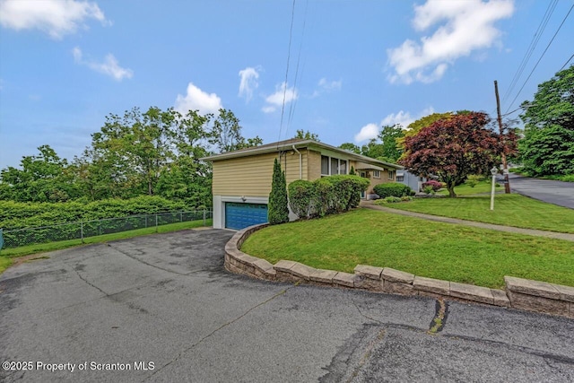 21 Leslie Dr, Scranton, PA 18505 - view of property exterior with asphalt driveway and an attached garage