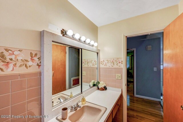 21 Leslie Dr, Scranton, PA 18505 - bathroom with tile walls, wood finished floors, wainscoting, and vanity