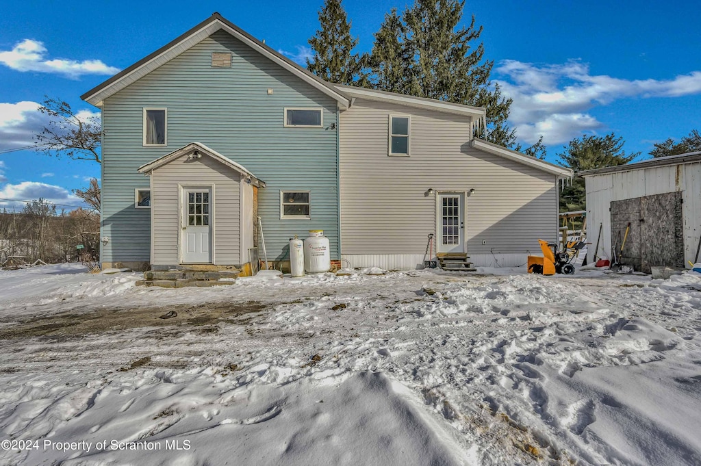 view of snow covered property