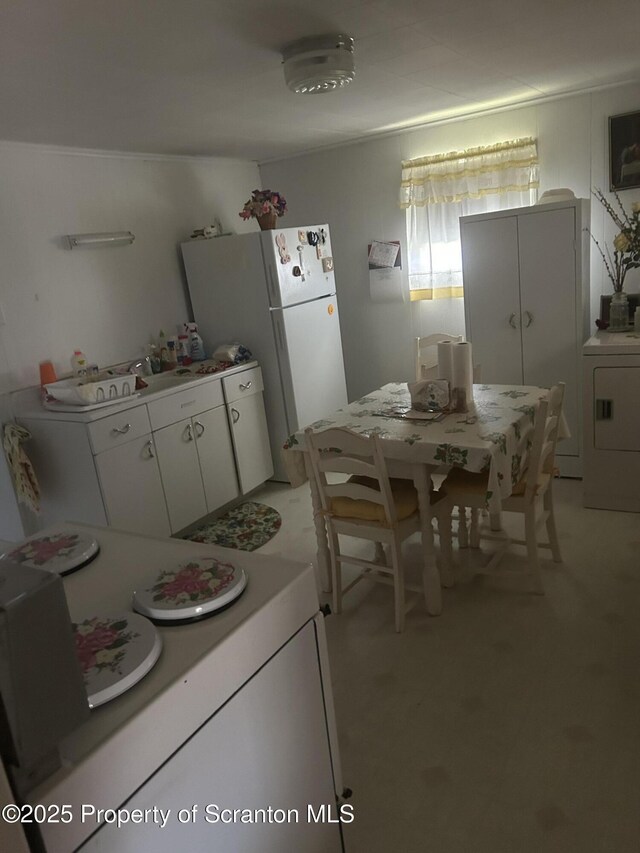 dining area with washer / dryer