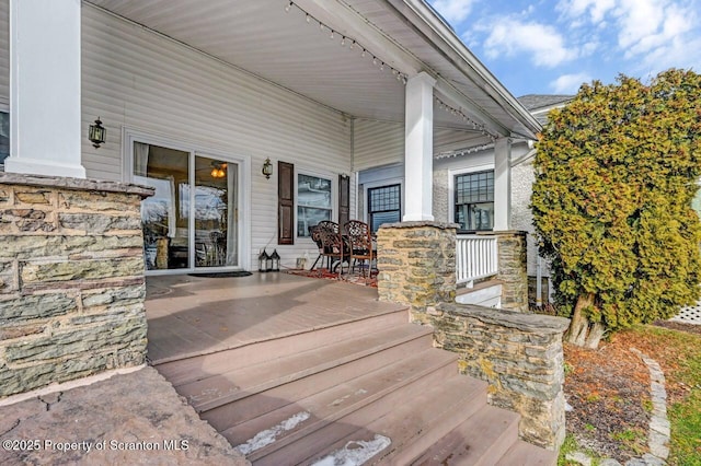 wooden deck with covered porch