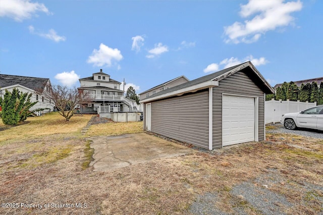 garage with fence