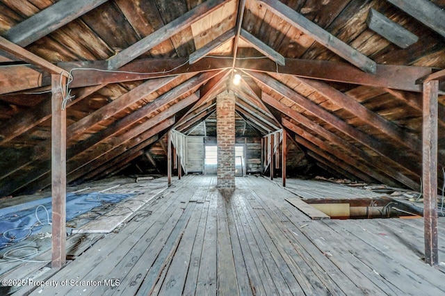 view of unfinished attic