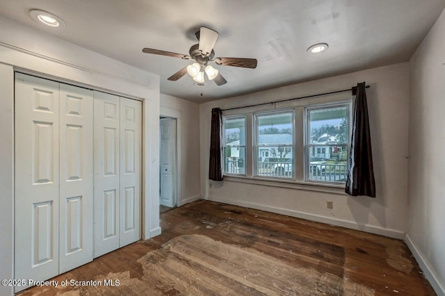 unfurnished bedroom with recessed lighting, baseboards, ceiling fan, and wood finished floors