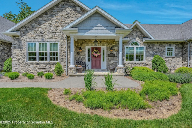 1000 Scenic Dr Unit L 34, Clarks Summit, PA 18411 - craftsman-style house with stone siding and covered porch