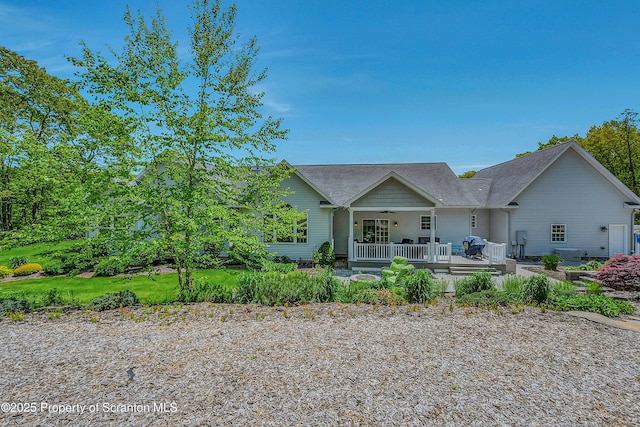 1000 Scenic Dr Unit L 34, Clarks Summit, PA 18411 - rear view of property featuring a ceiling fan and a shingled roof