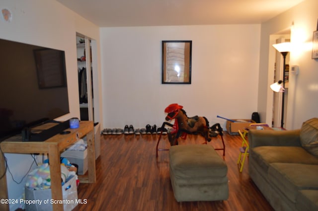 living room featuring dark hardwood / wood-style floors