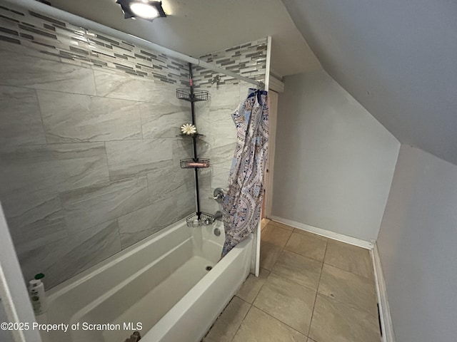 bathroom featuring tile patterned floors and shower / tub combo with curtain