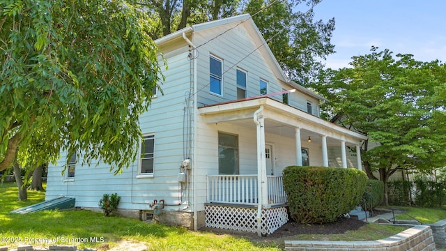 1303 Main St, Pittston, PA 18640 - view of front of home featuring covered porch